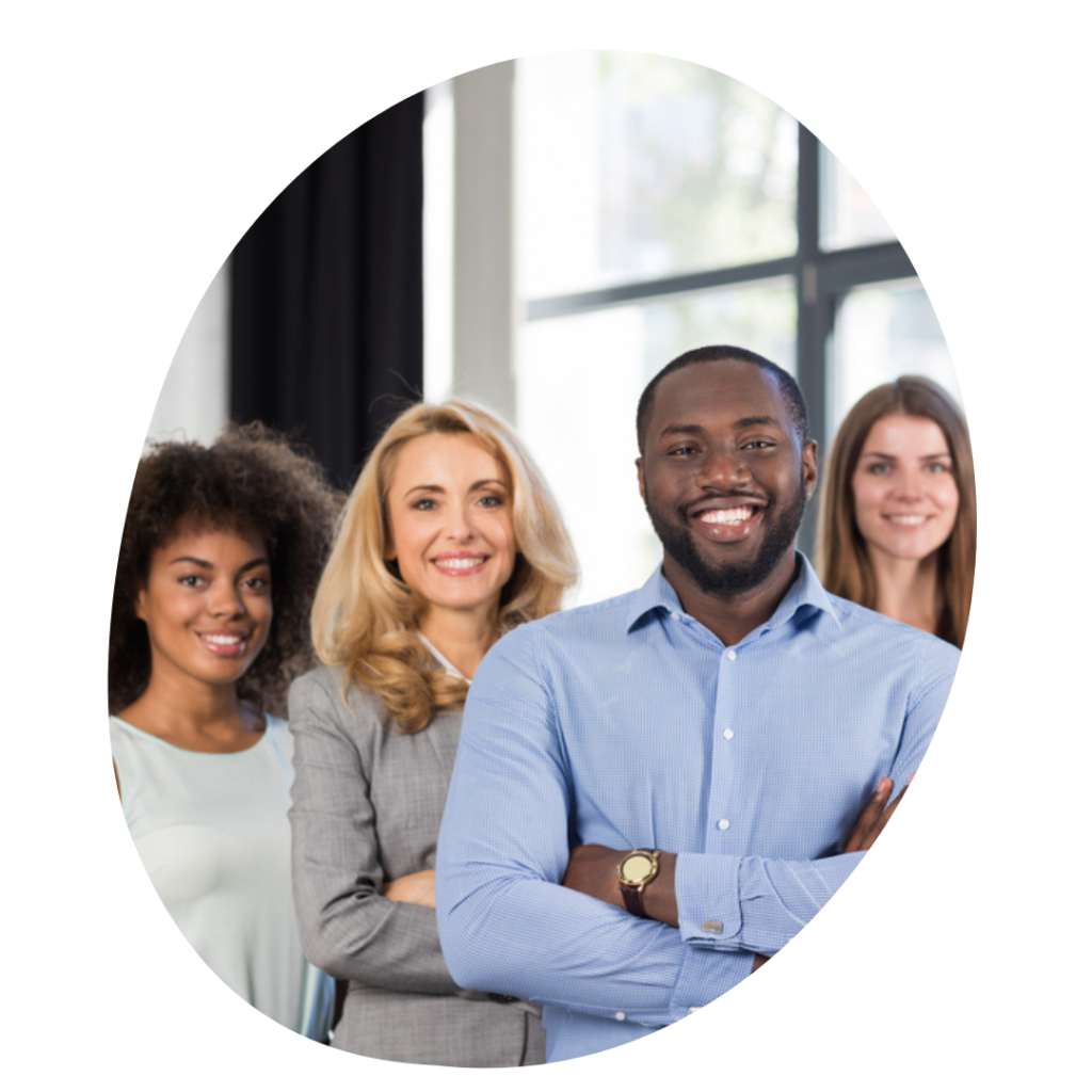 Four smiling diverse staff members.